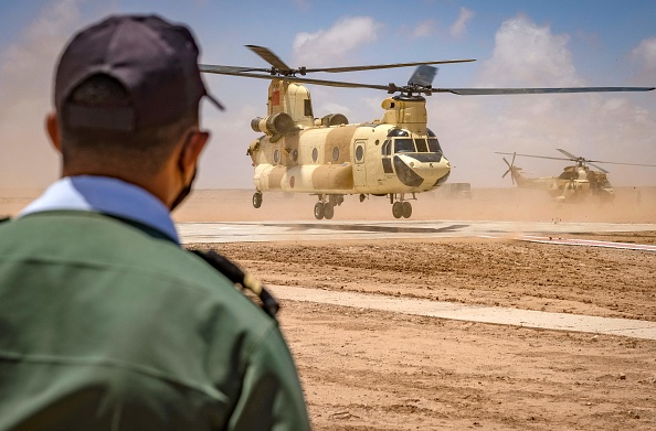 A Royal Moroccan Air Force CH-47 Chinook military helicopter takes off during the "African Lion" military exercise in the Tan-Tan region in southwestern Morocco on June 18, 2021. (Photo by FADEL SENNA / AFP) (Photo by FADEL SENNA/AFP via Getty Images)