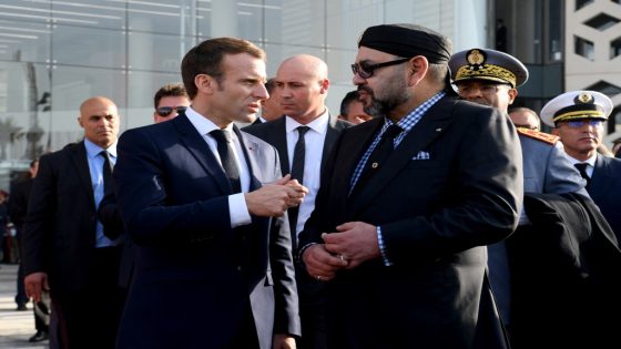 Moroccan King Mohammed VI (R) speaks with French President Emmanuel Macron (L) after inaugurating a high-speed line at Rabat train station on November 15, 2018. - French President Emmanuel Macron will visit Morocco on November 15 to take part in the inauguration of a high-speed railway line that boasts the fastest journey times in Africa or the Arab world. (Photo by CHRISTOPHE ARCHAMBAULT / POOL / AFP)